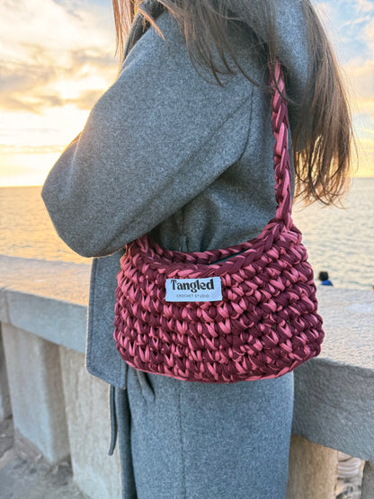 Handmade blush pink shoulder bag crafted from 100% recycled cotton, eco-friendly and stylish for everyday wear.