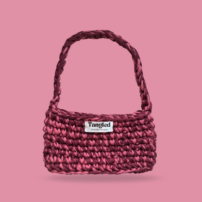 Handmade blush pink shoulder bag crafted from 100% recycled cotton, eco-friendly and stylish for everyday wear.